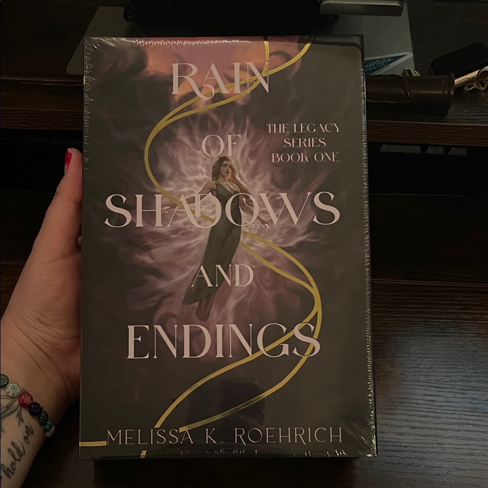 Rain of Shadows and Endings by Melissa K. Roehrich - Purple & Gold Hardcover